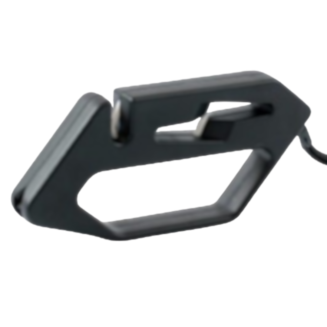 Close-up of a black, handheld knife sharpener. The sharpener has a simple design with a small handle and sharpening groo